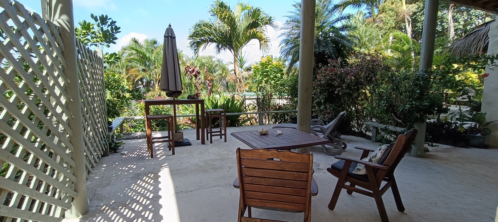 Moko private patio with outdoor seating and dining